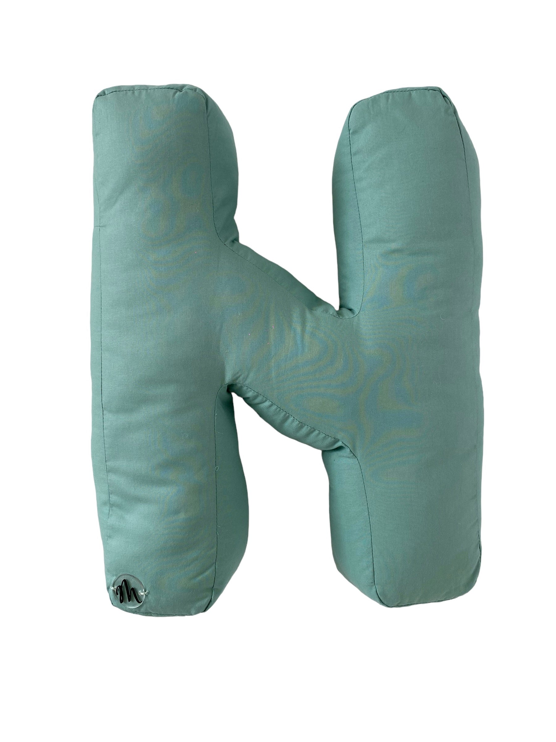 Cuscino a forma di lettere fatto a mano